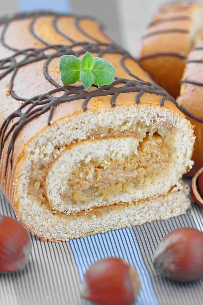 istock Sweet roll with cream and nuts 490251590