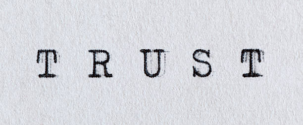 istock Trust written on white paper with old typewriter. 490252048