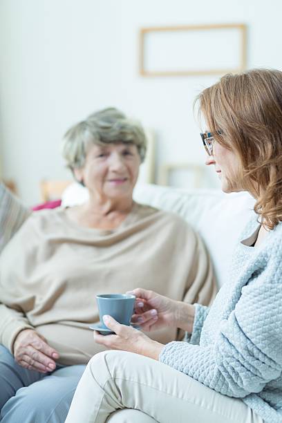 istock Elderly woman during conversation 490252252