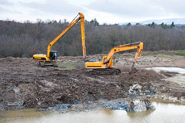 istock Soil pollution restoration with excavating. 490261579
