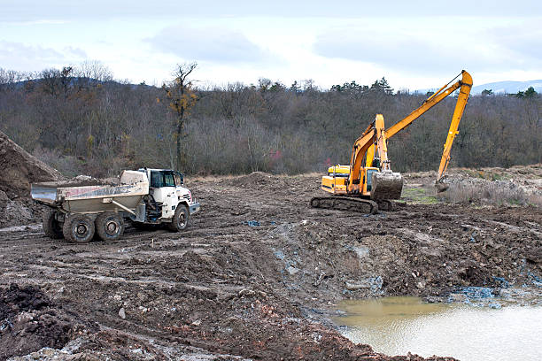 istock Soil pollution restoration with excavating. 490261583