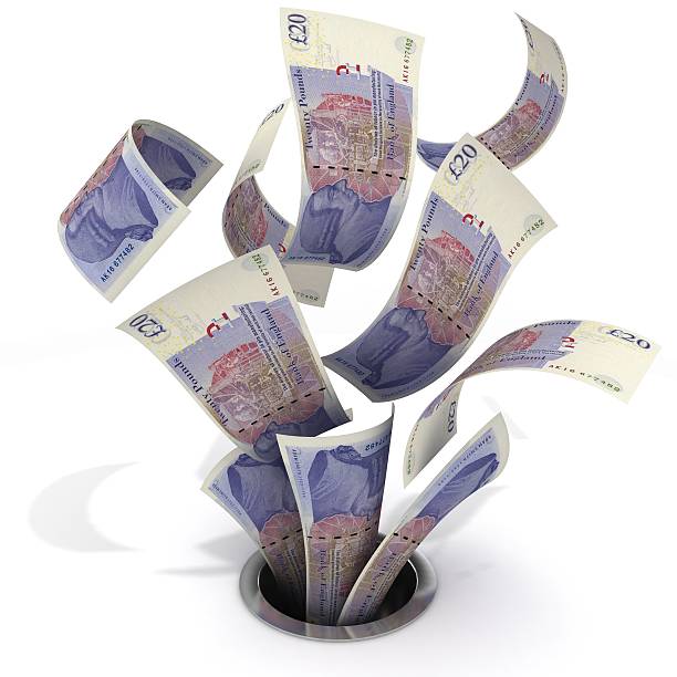 istock British Pounds - Money Down the Drain 490262383