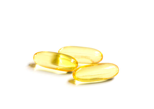 istock Isolated fish oil capsules 490262387