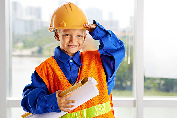 little foreman - child building activity construction engineer stock-fotos und bilder