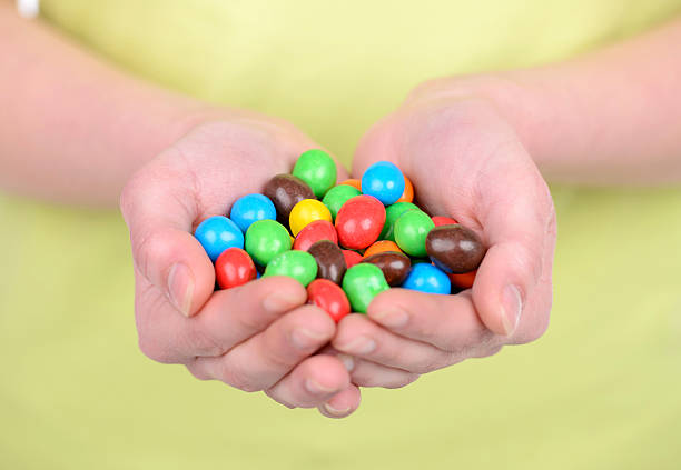 istock Girl and Candy 490262823