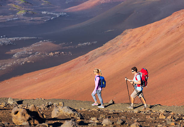 istock Hikers enjoying walk on amazing mountain trail 490263149
