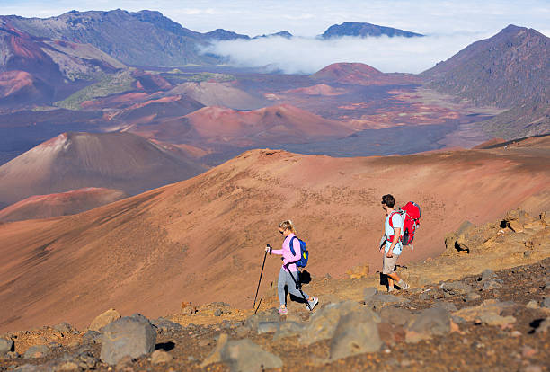 istock Hikers enjoying walk on amazing mountain trail 490263157