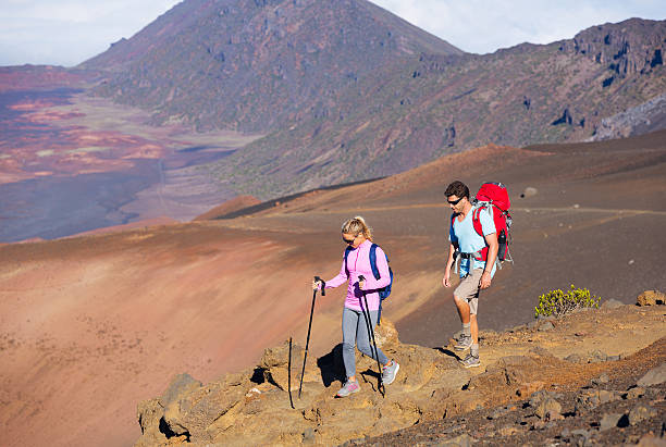 istock Hikers enjoying walk on amazing mountain trail 490263163