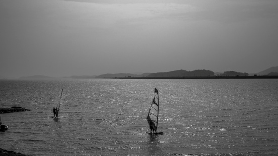 Wind surfing in South Korea. Black and White