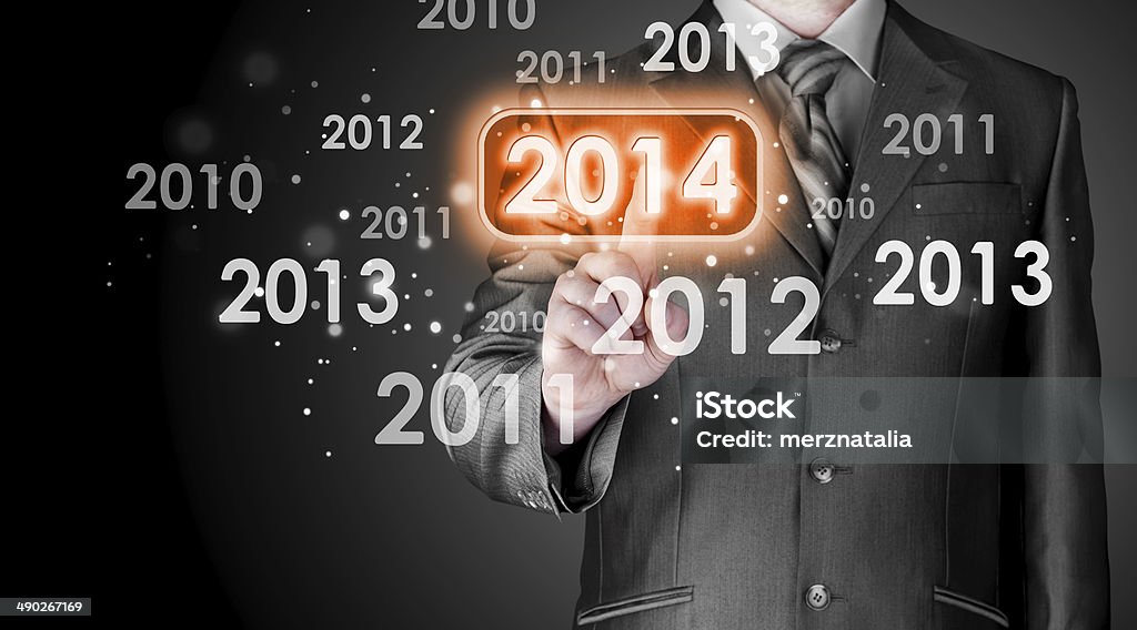Businessman touching new year 2014 2014 Stock Photo