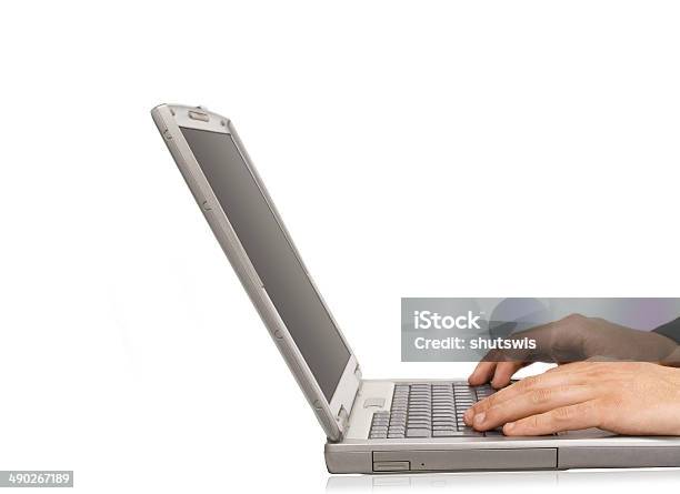 Businessman Typing On A Notebook Stock Photo - Download Image Now - Adult, Business, Businessman