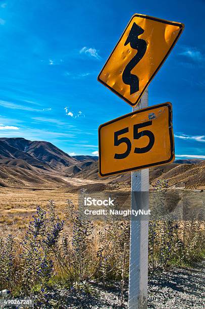 Warning Sign In New Zealand Road Stock Photo - Download Image Now - Backgrounds, Car, Forest
