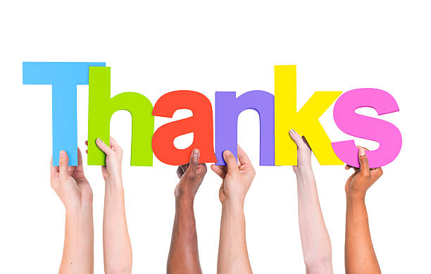 istock Multiethnic Group of Hands Holding Word Thanks 490267309