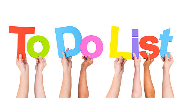 istock Diverse Hands Holding Word To Do List 490267521