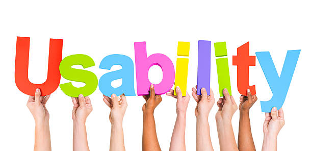 istock Multiethnic Group of Hands Holding Word Usability 490267821