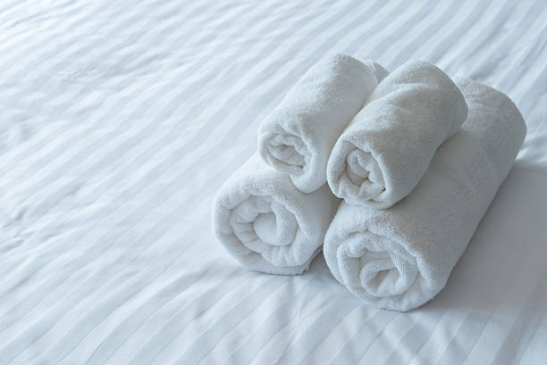 istock white bath towels in bed room, Room service 490273954