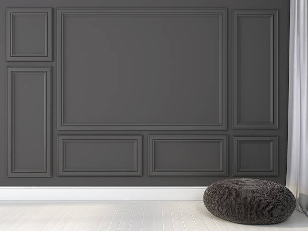 istock Knitted ottoman near gray wall 490275230