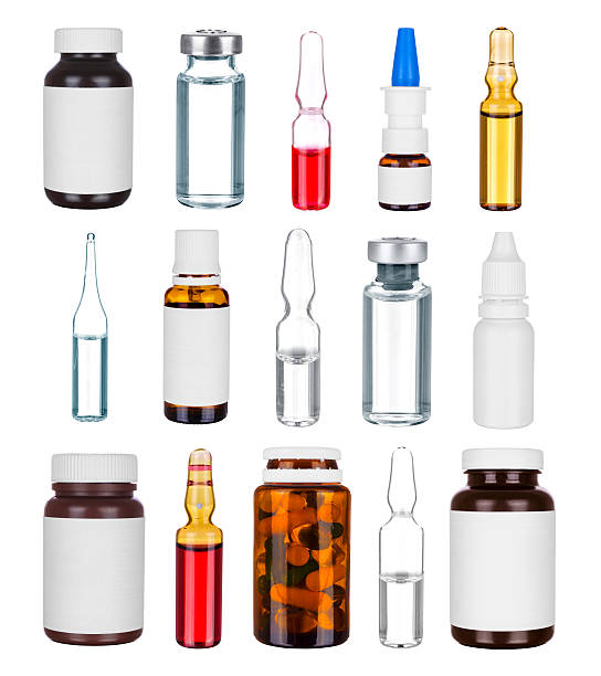 Medicine bottles Medicine bottles and ampules, isolated on white ampoule photos stock pictures, royalty-free photos & images