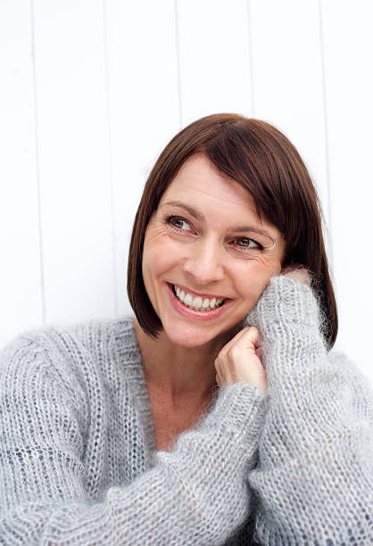 istock Older woman smiling 490276596