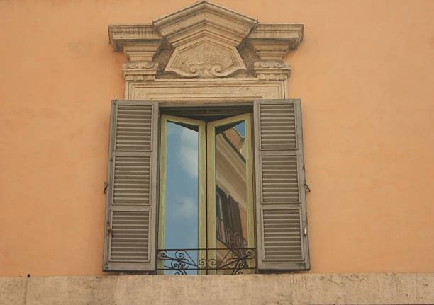 istock Reflections in a window in Rome, Italy 490278110