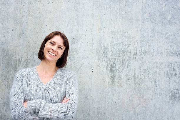 istock Cheerful older woman in wool sweater 490278518
