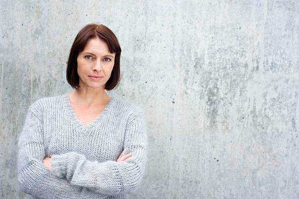 istock Attractive older woman in wool sweater 490279240