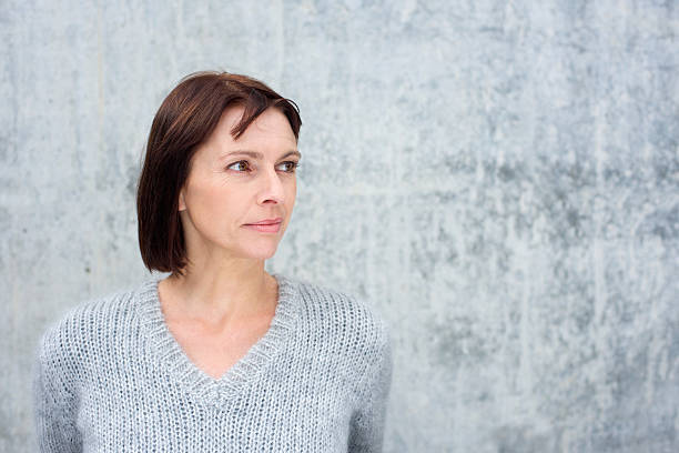 istock Attractive older woman looking away 490280014