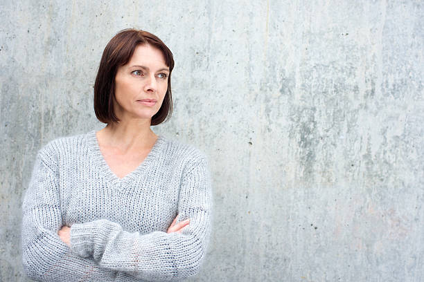 istock Older woman in wool sweater 490280320