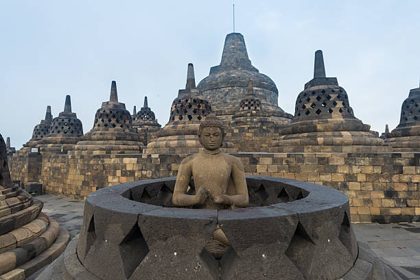 istock buddha sculpture stupa Borobudur Indonesia 490281054