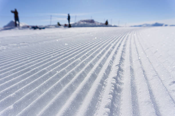 istock Fresh snow groomer tracks on a ski piste 490281472