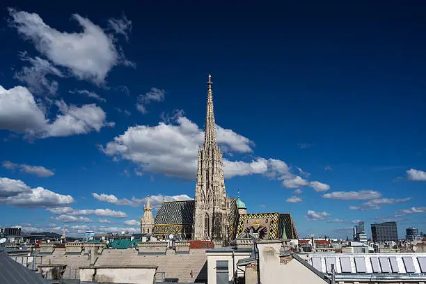 St. Stephens Cathedral Vienna, high angle view from cityscape with cumulus clouds