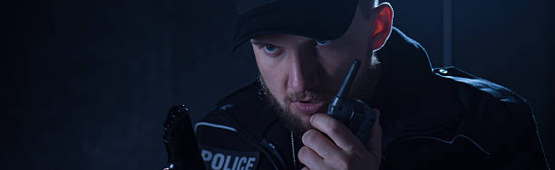 istock Holding shortwave radio and gun 490282802