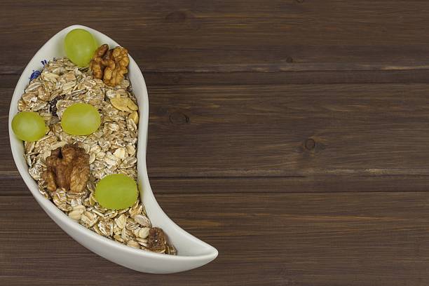 Healthy Diet breakfast of oatmeal, cereal and fruit.