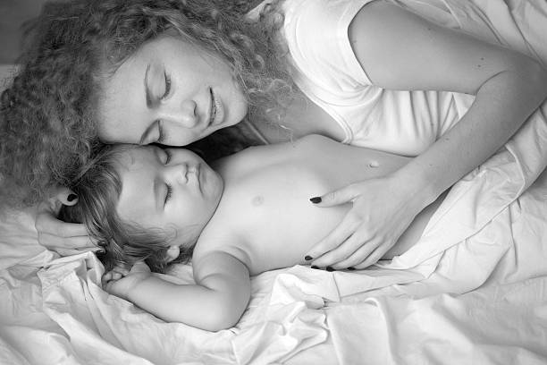 istock Mother with sleeping baby 490283282