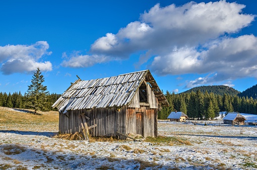 100+ year old wooden board barn on Montana homestead ranch in northwestern USA.