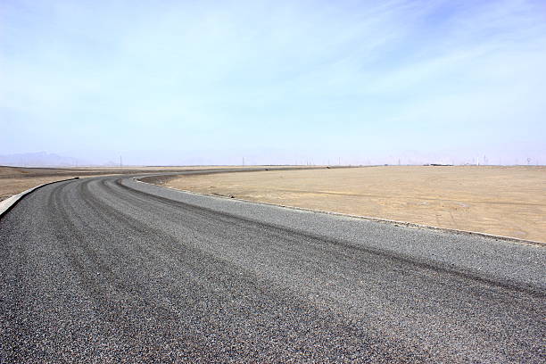 istock Asphalted road and the blue sky 490284030