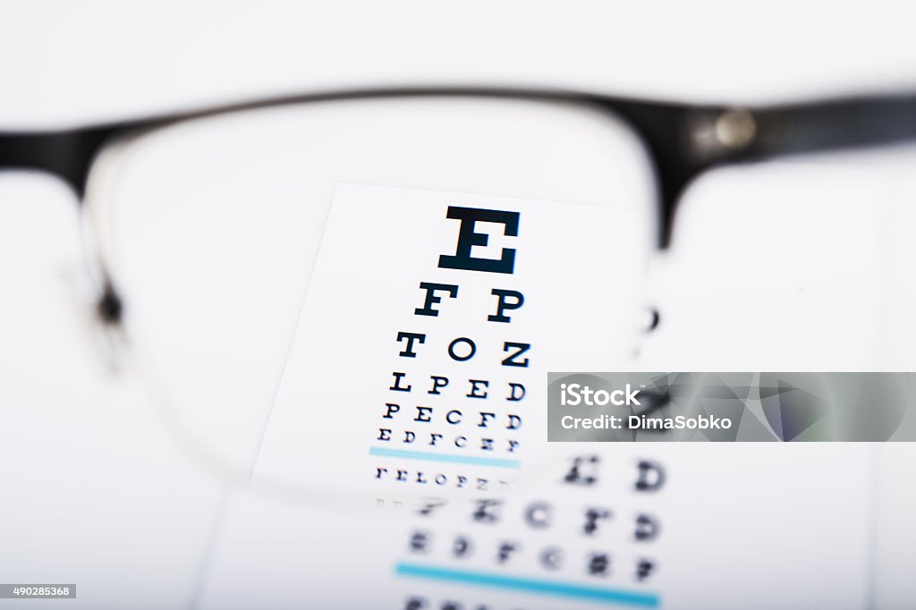 Gafas enfoque en el examen cuadro - Foto de stock de Optometrista libre de derechos