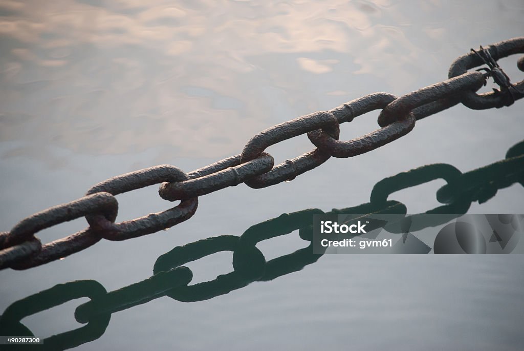 Chain above water 2015 Stock Photo