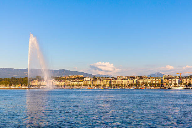 istock Water jet fountain at sunset in Geneva 490287628