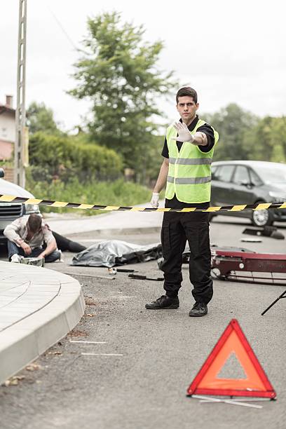 istock Policeman at road accident scene 490287954