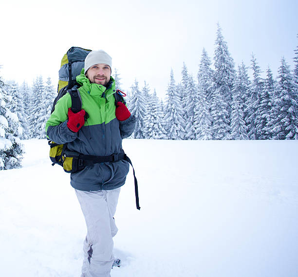 istock Hiker in the winter forest 490302348
