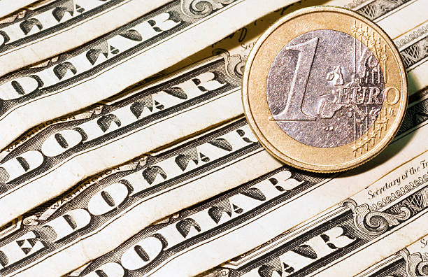 istock One euro and dollar banknotes 490303356