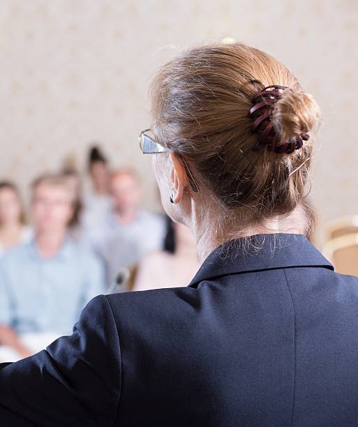 istock Woman speaking during party convention 490304718