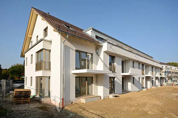 Photo of New residential buildings with outdoor facilities, Construction work near completion