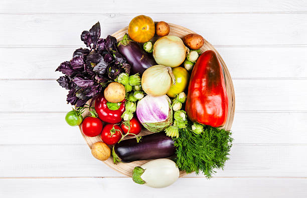 istock fresh vegetables on white wooden background 490306926