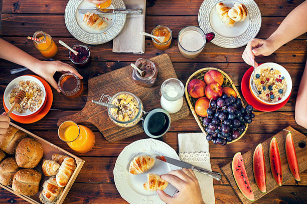 istock Young Happy Family Having Breakfast 490307684