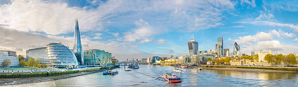 London Thames river, City and Shard London skyline, United Kingdom - cityscape with modern buildings and Tower of London in autumn under blue bright sky thames river stock pictures, royalty-free photos & images
