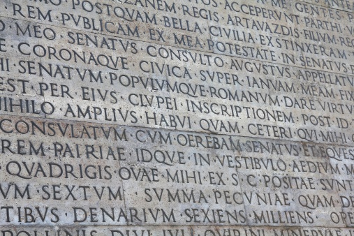 Rome, Italy. Latin inscriptions outside famous monument - Ara Pacis.