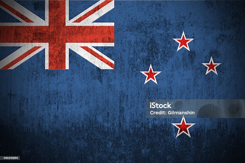 Grunge Flag Of New Zealand Weathered Flag Of New Zealand, fabric textured New Zealand Flag Stock Photo