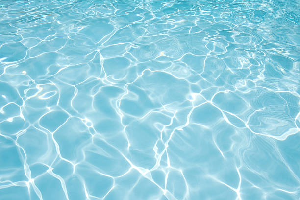 istock Clean and bright water surface in swimming pool 490311884
